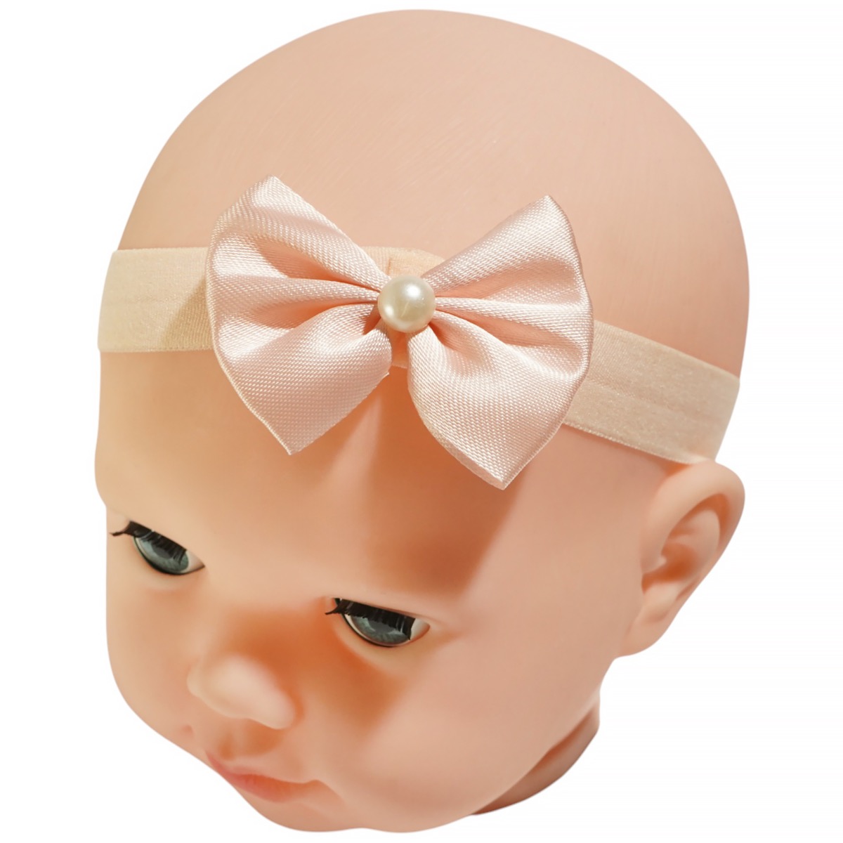 AZ κορδέλα μαλλιών σομόν που χαρίζει ρομαντική λεπτομέρεια