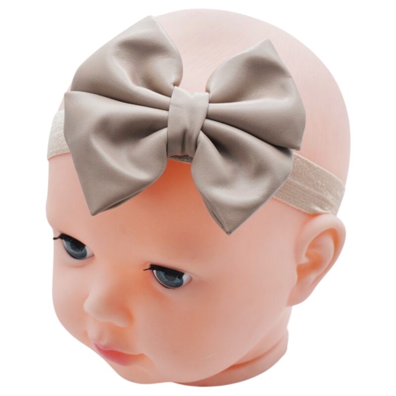 Όμορφη Defne κορδέλα μαλλιών μπεζ που συμπληρώνει κάθε εμφάνιση