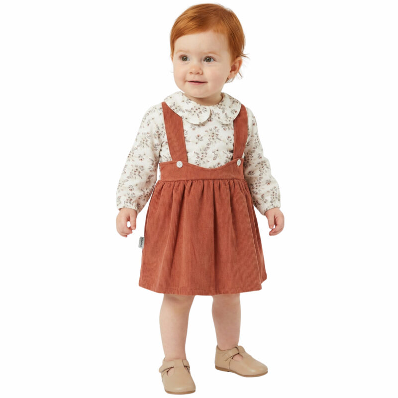 Κεραμιδί βρεφικό φόρεμα Bebedex's Plus με μακριά μανίκια και φλοράλ σχέδιο στο επάνω μέρος.